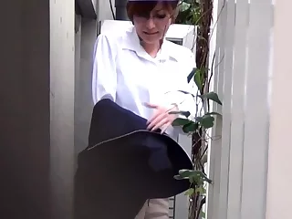 Asian lady pisses at work